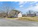 Street view of the home showing a neat lawn and tidy street at 406 E 29Th St, Kannapolis, NC 28083