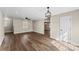 Spacious living room featuring hardwood floors, recessed lighting, and a ceiling fan at 406 E 29Th St, Kannapolis, NC 28083