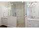Modern bathroom featuring a glass-enclosed shower, white subway tile, and marble countertop at 4117 Tyng Way, Charlotte, NC 28211
