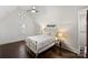 Bright bedroom with a bed, dark hardwood floors and a window at 4117 Tyng Way, Charlotte, NC 28211