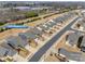 An aerial view of a neighborhood showcases blue homes with well-maintained landscaping and a clear view of 4521 Middlebury Ln at 4521 Middlebury Ln, Fort Mill, SC 29715
