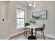 Inviting dining area featuring a marble table, stylish chairs, and bright window at 4521 Middlebury Ln, Fort Mill, SC 29715