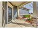 Inviting covered porch featuring stone accents and a stylish front door at 4521 Middlebury Ln, Fort Mill, SC 29715
