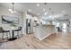 Open concept kitchen features stainless steel appliances, a large island, and wood flooring at 4521 Middlebury Ln, Fort Mill, SC 29715