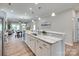 Bright open kitchen features granite countertops, stainless appliances, and seamlessly flows into living areas at 4521 Middlebury Ln, Fort Mill, SC 29715