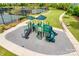 Community playground featuring modern play structures and a safe, cushioned play area for children at 4521 Middlebury Ln, Fort Mill, SC 29715