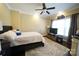 Inviting bedroom featuring a ceiling fan, hardwood floors, and neutral walls at 4531 Landmark Dr, Rock Hill, SC 29732