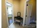 Hallway featuring a vanity space, a closet, and a door to the bathroom at 4531 Landmark Dr, Rock Hill, SC 29732