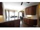 Open kitchen showcases granite counters, wooden cabinets, and a seamless transition into the dining area at 4531 Landmark Dr, Rock Hill, SC 29732