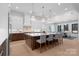 Gorgeous kitchen with a large island, pendant lighting, and a view into the dining area at 515 Deanne Dr, Rock Hill, SC 29730