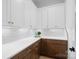 Bright butler's pantry featuring two-tone cabinets, modern countertops, and classic subway tile backsplash at 515 Deanne Dr, Rock Hill, SC 29730
