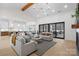 Open-concept living area with comfortable seating, backyard views, and seamless flow to kitchen and dining at 515 Deanne Dr, Rock Hill, SC 29730