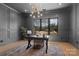 Home office featuring paneled walls, a large window overlooking the yard, and modern decor at 515 Deanne Dr, Rock Hill, SC 29730