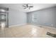Neutral bedroom featuring tile flooring and a ceiling fan at 624 Harris Nw St, Concord, NC 28025