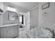 Bright bathroom featuring marble countertops, dual sinks, and updated fixtures at 786 Stratford Run Dr, Fort Mill, SC 29708
