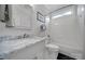 Bright bathroom showcasing a marble vanity, stylish fixtures, and a shower-tub combination with white tiling at 786 Stratford Run Dr, Fort Mill, SC 29708