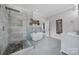 Modern bathroom with a glass shower, soaking tub, and stylish tile accents at 786 Stratford Run Dr, Fort Mill, SC 29708