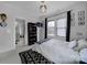 Bedroom with carpet, contemporary light fixtures, and ensuite bathroom at 786 Stratford Run Dr, Fort Mill, SC 29708