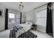 Comfortable bedroom with natural light, stylish décor, and carpet at 786 Stratford Run Dr, Fort Mill, SC 29708