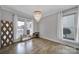 Serene bedroom with ample natural light, hardwood floors, and a decorative accent piece at 786 Stratford Run Dr, Fort Mill, SC 29708