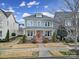Charming two-story home with inviting front porch and colorful landscaping at 786 Stratford Run Dr, Fort Mill, SC 29708