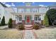 Inviting home featuring a classic front porch and meticulously maintained landscaping at 786 Stratford Run Dr, Fort Mill, SC 29708