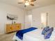 Relaxing main bedroom with a dresser, soft carpet, ceiling fan and an ensuite bathroom at 8157 Merryvale Ln, Charlotte, NC 28214