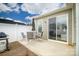 Outdoor patio features a seating area and sliding glass doors to the home at 8157 Merryvale Ln, Charlotte, NC 28214