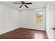 Bright bedroom features wood-look floor, natural light from window creating a peaceful atmosphere perfect for unwinding and relaxing at 8932 Raven Park Dr, Charlotte, NC 28216