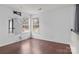Inviting bedroom features wood-look floors, offering a clean and versatile space for relaxation and personalization at 8932 Raven Park Dr, Charlotte, NC 28216