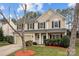 Charming two-story home with a well-manicured lawn, attached garage, and classic curb appeal at 8932 Raven Park Dr, Charlotte, NC 28216