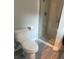 This clean and modern bathroom includes a shower and toilet at 920 Oakridge Farm Hwy, Mooresville, NC 28115