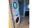 Bathroom featuring toilet, shower and a modern washer and dryer at 920 Oakridge Farm Hwy, Mooresville, NC 28115