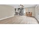 Open-concept living space featuring a ceiling fan and a kitchen with eating area at 920 Oakridge Farm Hwy, Mooresville, NC 28115
