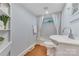 Clean bathroom with modern fixtures and shower-tub combo at 1006 N Ridge Ave, Kannapolis, NC 28083
