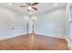 This bedroom features hardwood floors, and white trim at 1006 N Ridge Ave, Kannapolis, NC 28083