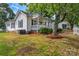 Charming single-Gathering home with a well-maintained lawn and a cozy front porch at 1006 N Ridge Ave, Kannapolis, NC 28083