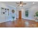 Inviting living room with hardwood floors, fireplace, and built-in shelving at 1006 N Ridge Ave, Kannapolis, NC 28083