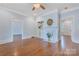 Spacious living room with hardwood floors, fireplace, and bright lighting at 1006 N Ridge Ave, Kannapolis, NC 28083