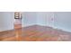 Spacious living room with beautiful hardwood floors and seamless flow to kitchen at 1006 N Ridge Ave, Kannapolis, NC 28083