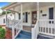 Covered front porch with white railings offering a welcoming entrance at 1006 N Ridge Ave, Kannapolis, NC 28083