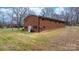 Large brick home with level backyard and access door at 104 Pop Davis Rd, Taylorsville, NC 28681