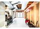 Spacious unfinished basement featuring white painted floors, exposed duct work, and convenient walkout access at 104 Pop Davis Rd, Taylorsville, NC 28681
