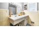 Neutral bathroom features a spacious vanity, storage, and decorative signs on the walls at 104 Pop Davis Rd, Taylorsville, NC 28681