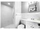 Clean bathroom features a shower, toilet, and vanity with a sink and a mirror at 104 Pop Davis Rd, Taylorsville, NC 28681