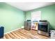 Clean laundry room features a stainless-steel washer and dryer with storage space at 104 Pop Davis Rd, Taylorsville, NC 28681