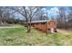 Two-story brick home featuring a walkout basement and sprawling backyard at 104 Pop Davis Rd, Taylorsville, NC 28681