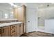 Bright bathroom features double sinks, cabinets, and a tiled shower with a glass door at 108 Sarah Ave, Newton, NC 28658