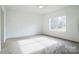 Bright bedroom featuring neutral carpet, natural light and white walls at 108 Sarah Ave, Newton, NC 28658