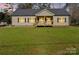 Charming single-story home featuring a welcoming front porch and well-maintained lawn at 108 Sarah Ave, Newton, NC 28658